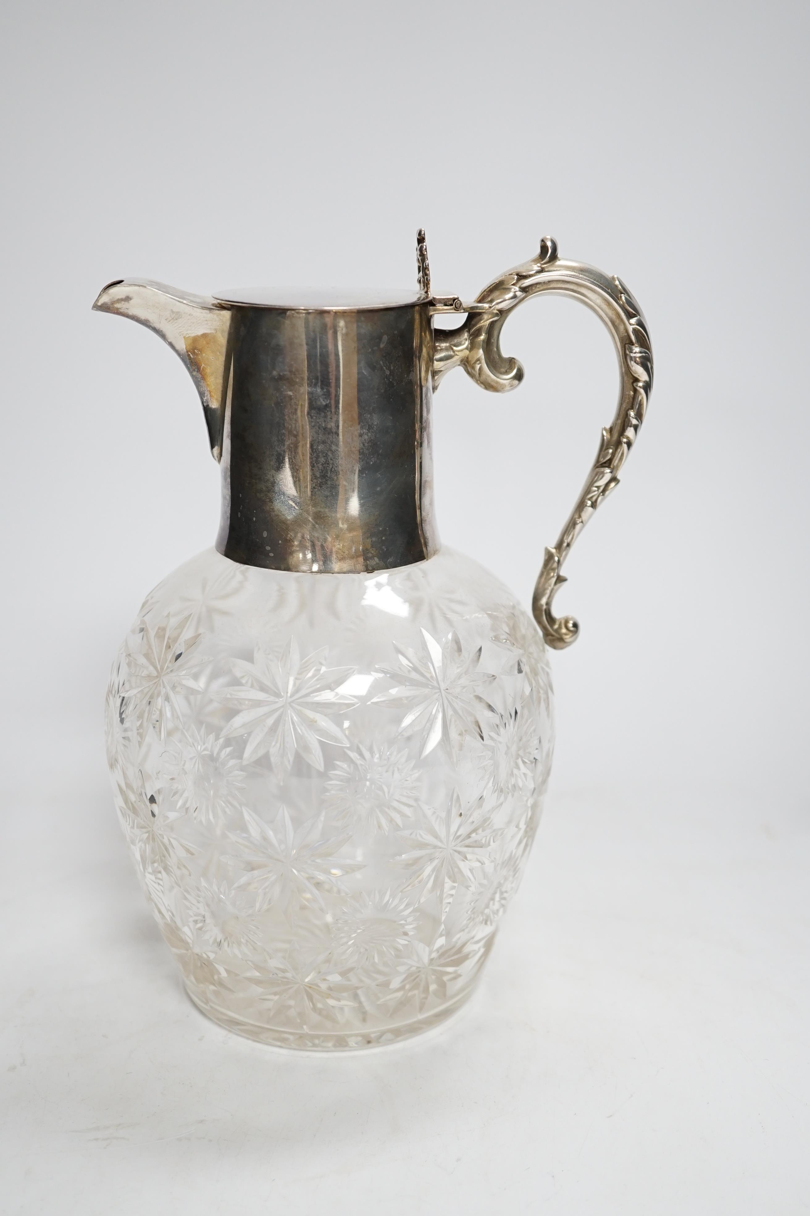 An Edwardian silver mounted cut glass claret jug, William Hutton & Sons, London, 1903, 21.8cm.
